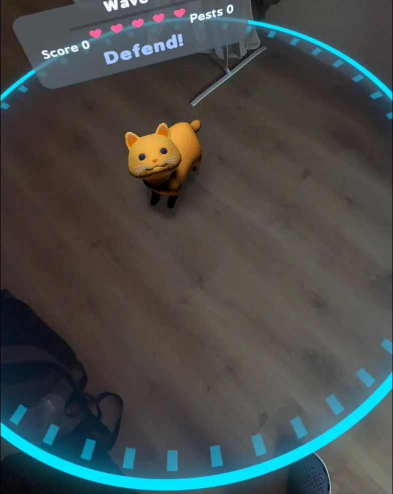 Guardian Mode in a real room: Tobby stands inside the glowing arena ring under a Defend! banner with score, hearts and pest counter